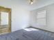 Bedroom featuring neutral walls, carpet flooring, a ceiling fan and natural light at 1049 Winding Water Way, Clermont, FL 34714