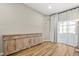 This room features a rustic sideboard and sheer curtains, creating a warm and inviting atmosphere at 122 Capri Dr, Davenport, FL 33897