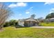 A lovely single-Gathering home boasting a well-maintained lawn and a convenient two-car garage at 12235 Warren Rd, Clermont, FL 34711