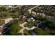 An aerial view showcases the property's prime location within a vibrant residential neighborhood at 12235 Warren Rd, Clermont, FL 34711