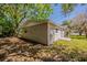 Wide angle view of the backyard, showing the yard and corner of the home at 1306 Shepherd Ave, Sanford, FL 32771