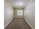 Bedroom featuring neutral carpeting and a window for natural light at 1306 Shepherd Ave, Sanford, FL 32771