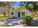 Charming single-story home with a well-manicured lawn and inviting front entrance at 1306 Shepherd Ave, Sanford, FL 32771