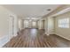 Spacious living room with luxury vinyl plank flooring and neutral color scheme at 1306 Shepherd Ave, Sanford, FL 32771