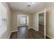 Living room featuring luxury vinyl plank flooring, neutral paint, and lots of light at 1306 Shepherd Ave, Sanford, FL 32771