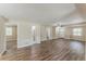 Bright living room with luxury vinyl plank flooring, neutral paint, and lots of light at 1306 Shepherd Ave, Sanford, FL 32771