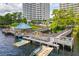 Picturesque waterfront condo with a dock, gazebo, boat, and kayak access for outdoor activities at 13427 Blue Heron Beach Dr # 103, Orlando, FL 32821