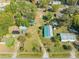 Spacious lot featuring a main house, outbuildings, landscaping, and generous yard space at 15765 Sunflower Trl, Orlando, FL 32828