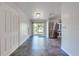 Dining area features tile flooring, sliding glass doors, and a stainless steel refrigerator at 15765 Sunflower Trl, Orlando, FL 32828