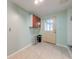 Mud room featuring neutral paint color, and a door leading to the exterior of the home at 15765 Sunflower Trl, Orlando, FL 32828