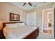 Bedroom featuring a traditional style bed and a double door closet at 16736 Broadwater Ave, Winter Garden, FL 34787