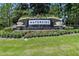 Beautifully landscaped 'Waterside' community entrance sign with cascading waterfall feature at 16736 Broadwater Ave, Winter Garden, FL 34787