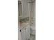 Bathroom features a vanity with marble countertop and elegant fixtures at 2014 Corner Meadow Cir, Orlando, FL 32820