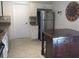 Kitchen with stainless steel refrigerator and granite countertops plus center island at 2014 Corner Meadow Cir, Orlando, FL 32820