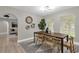 Dining area featuring a wooden table, seating for four, and seamless access to living room at 3052 Saratoga Dr, Orlando, FL 32806