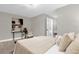 Main bedroom featuring a bed with decorative pillows and wall art at 3052 Saratoga Dr, Orlando, FL 32806