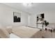 Main bedroom featuring a bed with decorative pillows and modern wall art at 3052 Saratoga Dr, Orlando, FL 32806