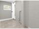 Bright room with tile floor, painted concrete block walls, and a window at 3052 Saratoga Dr, Orlando, FL 32806