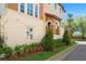 Charming two-story home with a stucco exterior and lush landscaping adding to the curb appeal at 316 Trieste Loop, Lake Mary, FL 32746