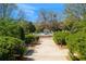 Scenic fountain surrounded by lush greenery, providing a tranquil and inviting community space at 316 Trieste Loop, Lake Mary, FL 32746