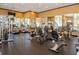 Community gym with modern exercise equipment including treadmills, ellipticals and weight machines at 316 Trieste Loop, Lake Mary, FL 32746