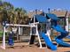 Community playground featuring swings, slides, and a climbing wall in a kid-friendly environment at 3772 Idlebrook Cir # 210, Casselberry, FL 32707