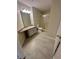 Clean bathroom with a shower, toilet, sink, and ample counter space at 413 Summit Ridge Pl # 115, Longwood, FL 32779
