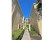 View of the rear condo units and walkways at 413 Summit Ridge Pl # 115, Longwood, FL 32779