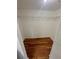 Spacious walk-in closet featuring hardwood floors and installed shelving at 413 Summit Ridge Pl # 115, Longwood, FL 32779