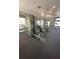 Modern fitness center with various weight machines and exercise equipment for a comprehensive workout at 413 Summit Ridge Pl # 115, Longwood, FL 32779