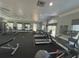 Well-equipped fitness center with treadmills and exercise equipment for residents' health at 413 Summit Ridge Pl # 115, Longwood, FL 32779