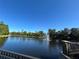 Community lake and fountain, enhancing the natural beauty of the area, creating a calming view at 413 Summit Ridge Pl # 115, Longwood, FL 32779