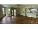 Spacious living room featuring attractive flooring, neutral walls, and abundant natural light at 413 Summit Ridge Pl # 115, Longwood, FL 32779