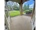 Screened in patio with view of treelined backyard at 413 Summit Ridge Pl # 115, Longwood, FL 32779