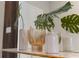 Stylish modern vases with greenery atop a white marble counter at 4321 Lana Avenue, Davenport, FL 33897
