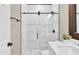 Bright bathroom featuring a modern shower with marble-like tiles and stylish black fixtures at 4955 Castle E St, Kissimmee, FL 34758