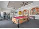 A community game room includes a pool table, ping pong table, foosball, and vending machine at 4955 Castle E St, Kissimmee, FL 34758