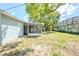 View of the backyard and screened in patio at 5210 Grandview Dr, Orlando, FL 32808