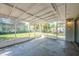 Spacious screened porch with concrete floors at 5210 Grandview Dr, Orlando, FL 32808