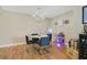 Bright dining area with a stylish chandelier, bar cart and marble table set for four at 530 E Central Blvd # 501, Orlando, FL 32801