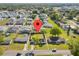 Aerial neighborhood view showing the property with mature trees at 536 Ellerbe Way, Lakeland, FL 33801