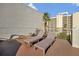 This rooftop deck features lounge chairs and a fire pit with views of the Ramada hotel at 6165 Carrier Dr # 3512, Orlando, FL 32819