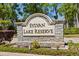 Sylvan Lake Reserve community sign providing a sense of neighborhood identity with attractive landscaping at 6651 Sylvan Woods Dr, Sanford, FL 32771