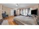 Bright living room featuring hardwood floors, neutral walls, and natural light at 941 Grey Oak Ct, Orlando, FL 32809