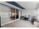 Enclosed sunroom with tiled floors, white walls, and lots of natural light at 1234 Villa Ln # S, Apopka, FL 32712