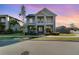 Charming two-story home featuring dual balconies, manicured lawn and lush landscaping for great curb appeal at 12849 Bovet Ave, Orlando, FL 32827