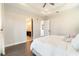 Bright main bedroom featuring a tray ceiling and an ensuite bathroom at 12849 Bovet Ave, Orlando, FL 32827