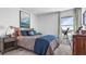 Bedroom with gray carpet, telescope, dresser and nightstand at 132 Adventure Ave, Davenport, FL 33837