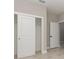 Bedroom showcasing a large closet with sliding doors and a neutral color palette at 13457 Sw 53Rd St, Ocala, FL 34481