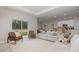 Spacious open-concept living area with view to outdoor space and open to dining and kitchen at 13457 Sw 53Rd St, Ocala, FL 34481